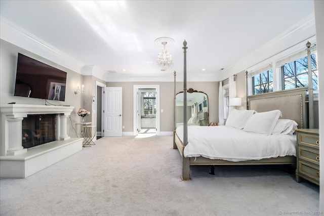 bedroom with carpet, a notable chandelier, and crown molding