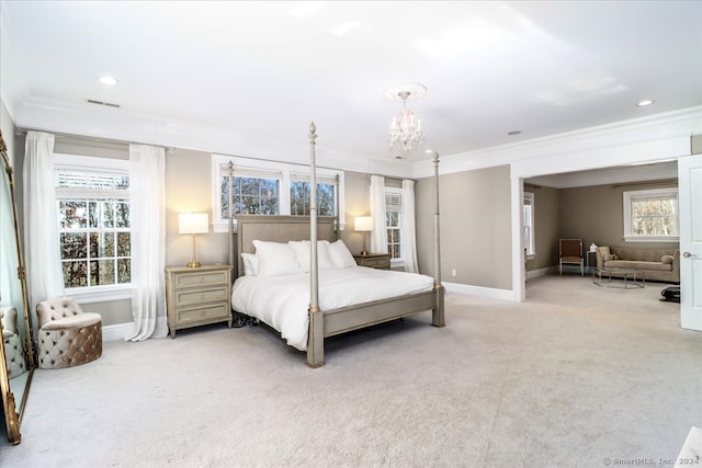 bedroom featuring light carpet, crown molding, and a chandelier