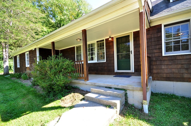 doorway to property with covered porch