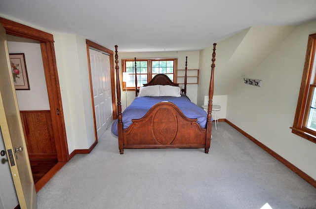 carpeted bedroom with a closet