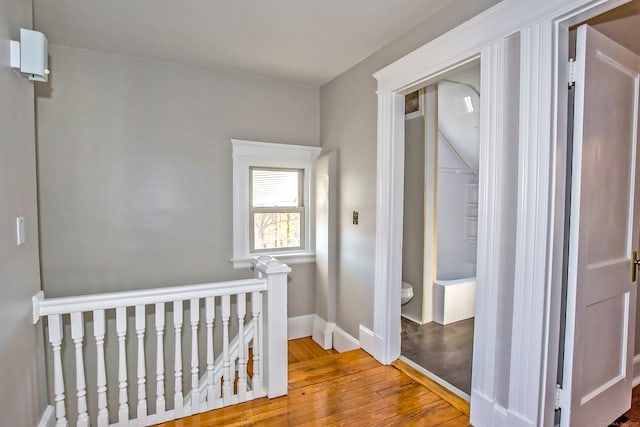 hall featuring hardwood / wood-style flooring