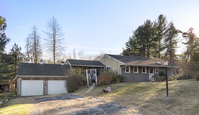 ranch-style house featuring a garage