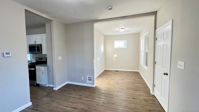 interior space with dark wood-type flooring