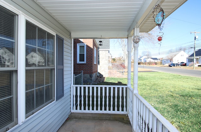 balcony featuring a porch