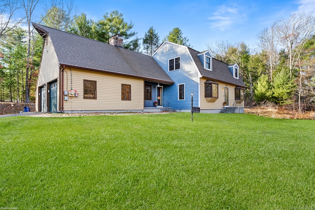 cape cod home with a garage and a front yard