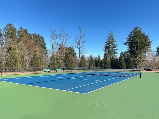 view of sport court with community basketball court and fence