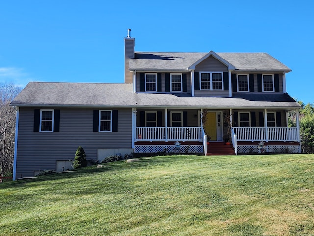 view of front of house with a porch and a front lawn