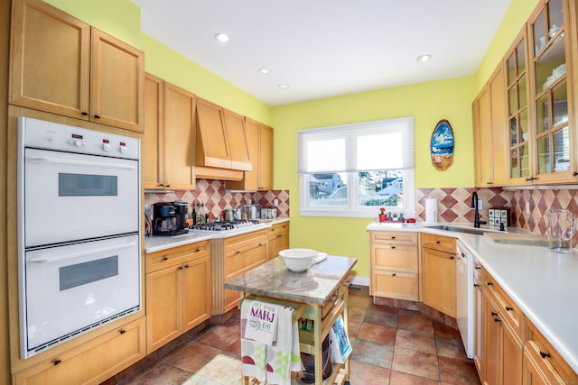 1 Dunbar Rd, Milford, CT 06460 - kitchen with white appliances, a sink, light countertops, decorative backsplash, and recessed lighting