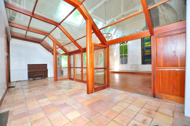 14 River Rd, Cornwall, CT 06796 - unfurnished living room with vaulted ceiling, french doors, and healthy amount of natural light
