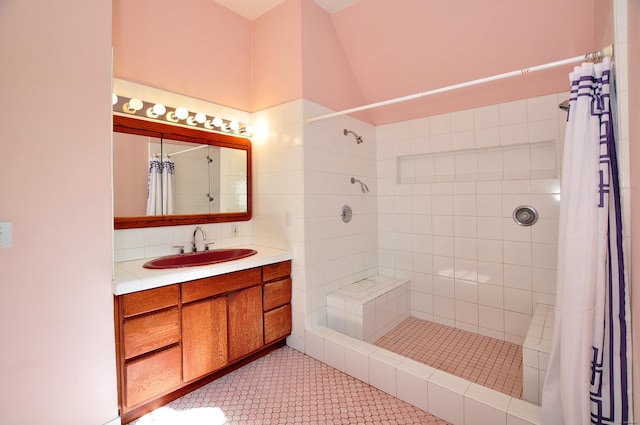 14 River Rd, Cornwall, CT 06796 - bathroom featuring tiled shower, vanity, and tile patterned flooring