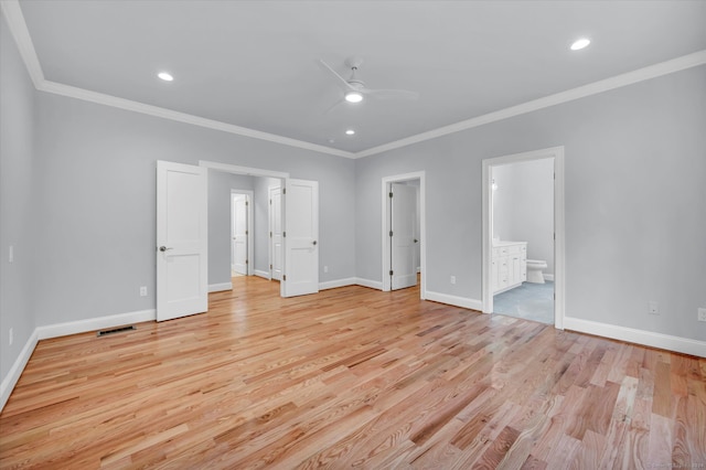 unfurnished bedroom with ensuite bathroom, ceiling fan, light wood-type flooring, and crown molding