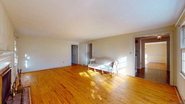 unfurnished living room with light hardwood / wood-style flooring