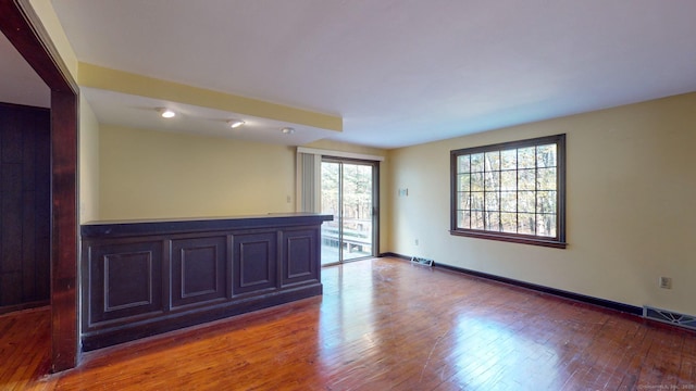 empty room featuring hardwood / wood-style floors