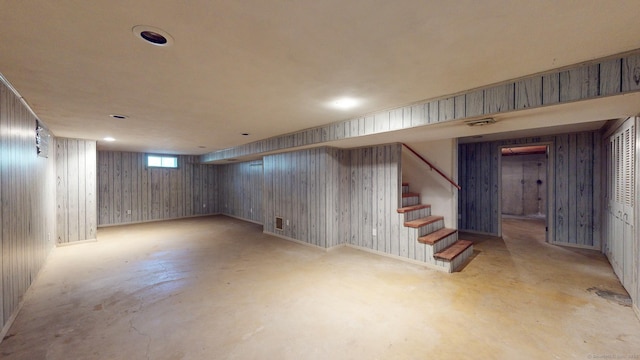 basement with wood walls