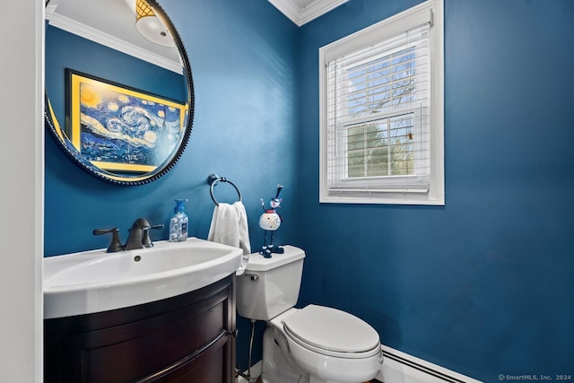 bathroom with vanity, toilet, baseboard heating, and crown molding