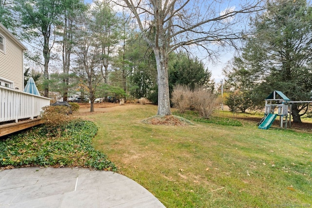 view of yard with a playground