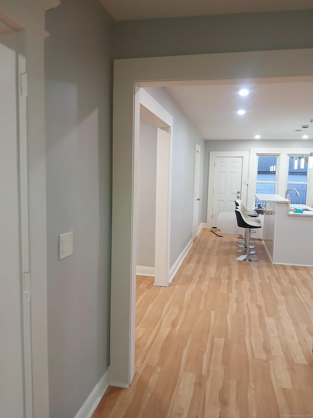 hall featuring light hardwood / wood-style flooring