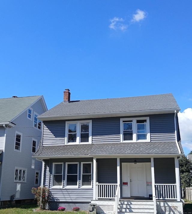 view of front of home featuring covered porch