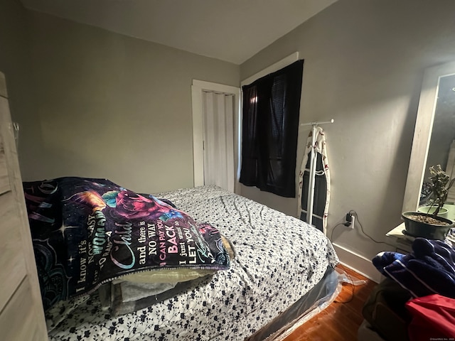666 Orchard St, New Haven, CT 06511 - bedroom featuring wood-type flooring and a closet