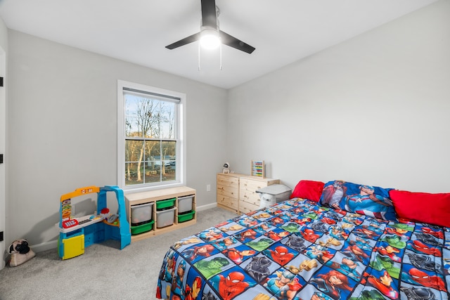 bedroom with ceiling fan and carpet