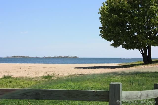 property view of water featuring a view of the beach