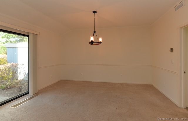 unfurnished room featuring light carpet, lofted ceiling, and a notable chandelier