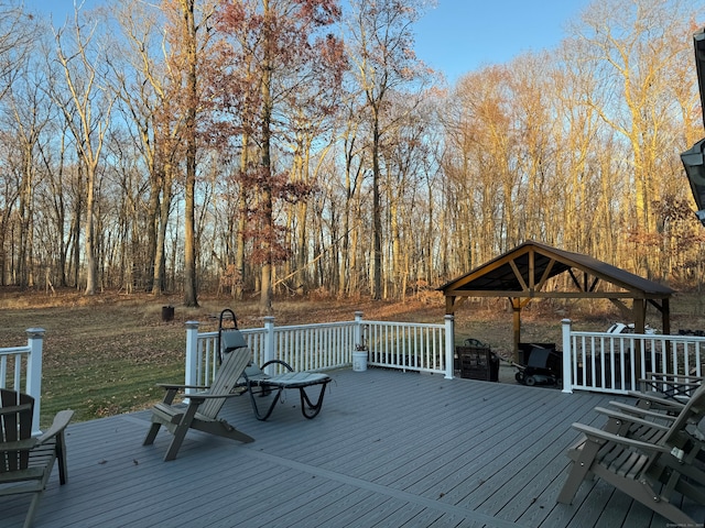 wooden deck with a gazebo