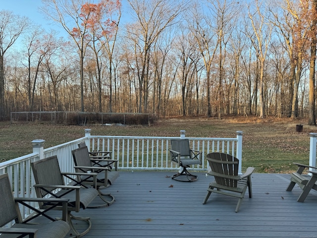 wooden deck with a yard