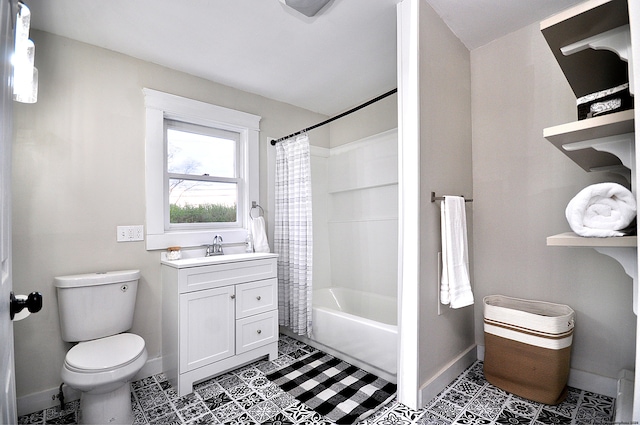 full bathroom featuring tile patterned flooring, vanity, toilet, and shower / tub combo with curtain