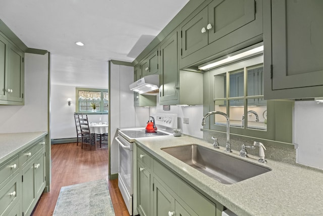 kitchen featuring sink, dark wood-type flooring, baseboard heating, electric stove, and green cabinetry