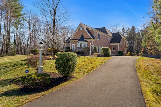 view of front of property with a front lawn