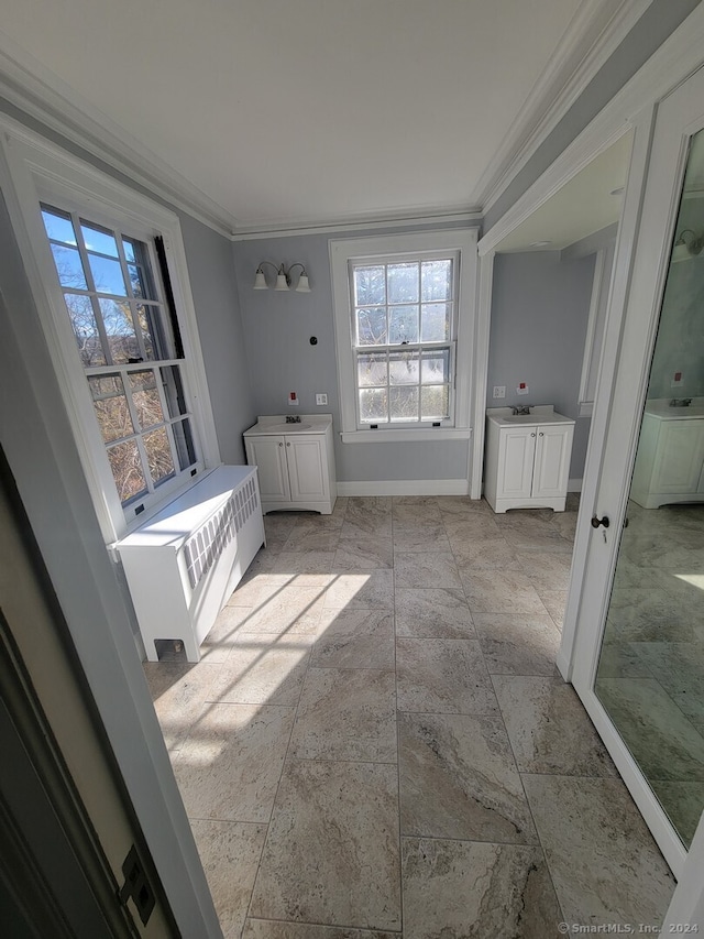 bathroom with crown molding