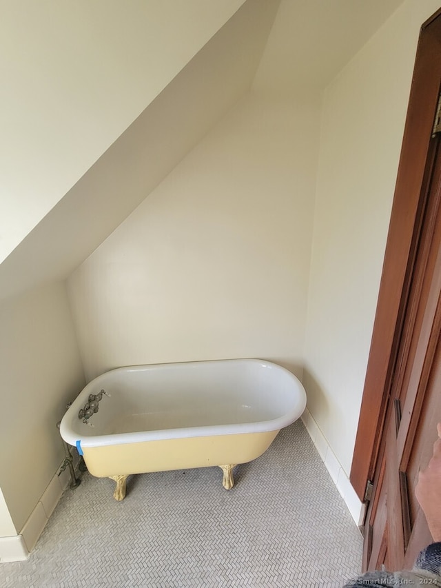 bathroom featuring a tub