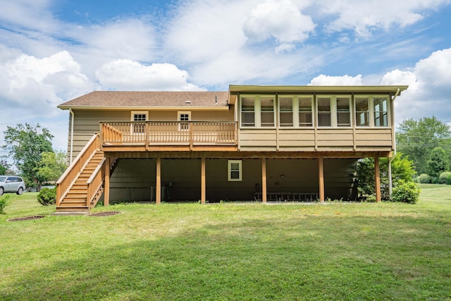 45 Wentworth Dr, East Hartford, CT 06118 - rear view of property featuring a deck, a lawn, stairway, and a sunroom