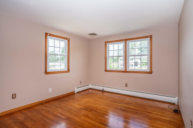 45 Wentworth Dr, East Hartford, CT 06118 - unfurnished room featuring a baseboard radiator and hardwood / wood-style flooring