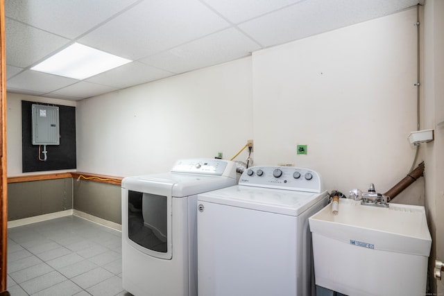 45 Wentworth Dr, East Hartford, CT 06118 - laundry area featuring light tile patterned floors, washing machine and dryer, and electric panel
