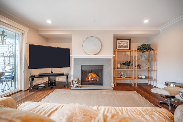 living room featuring crown molding and wood-type flooring