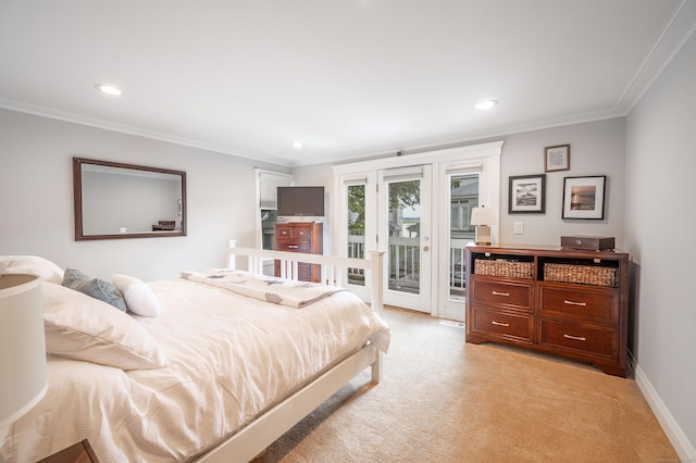 carpeted bedroom with access to exterior and crown molding