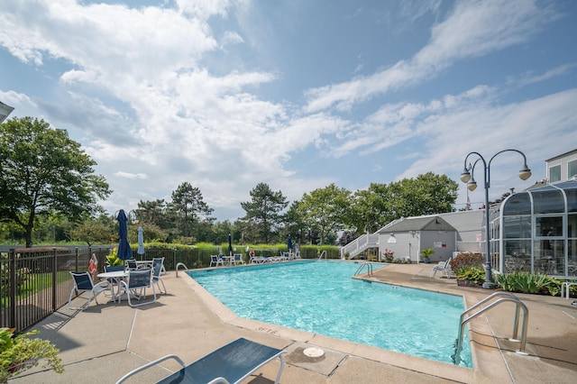 view of pool with a patio