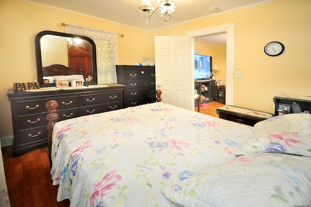 bedroom with dark hardwood / wood-style floors and crown molding