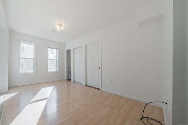 bedroom featuring light hardwood / wood-style flooring