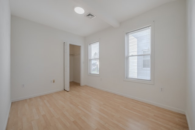 unfurnished bedroom featuring light hardwood / wood-style floors