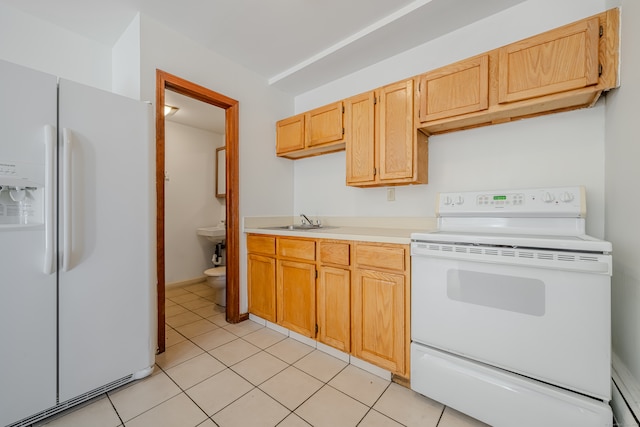 kitchen featuring light brown cabinetry, white appliances, light tile patterned floors, and sink