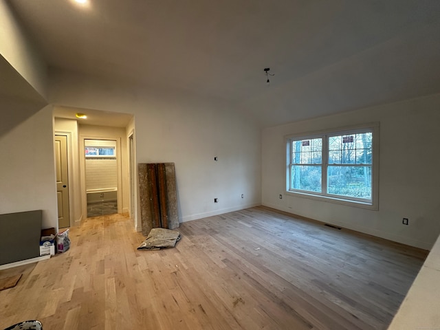 unfurnished living room with light wood-type flooring