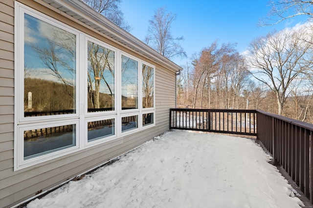 view of snow covered deck