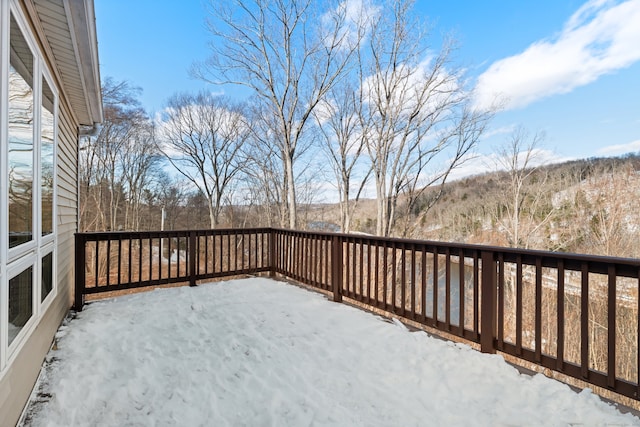 view of snow covered deck