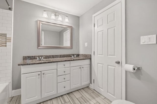 bathroom featuring vanity and tub / shower combination