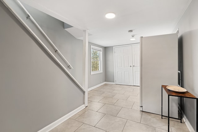 view of tiled foyer entrance