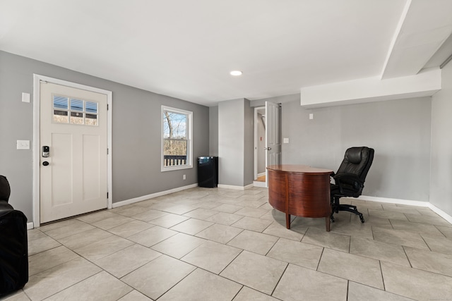 home office with light tile patterned floors