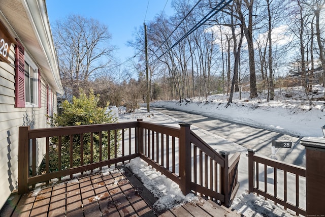 view of snow covered deck